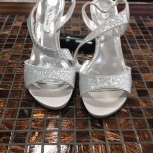 Fancy silver sandals